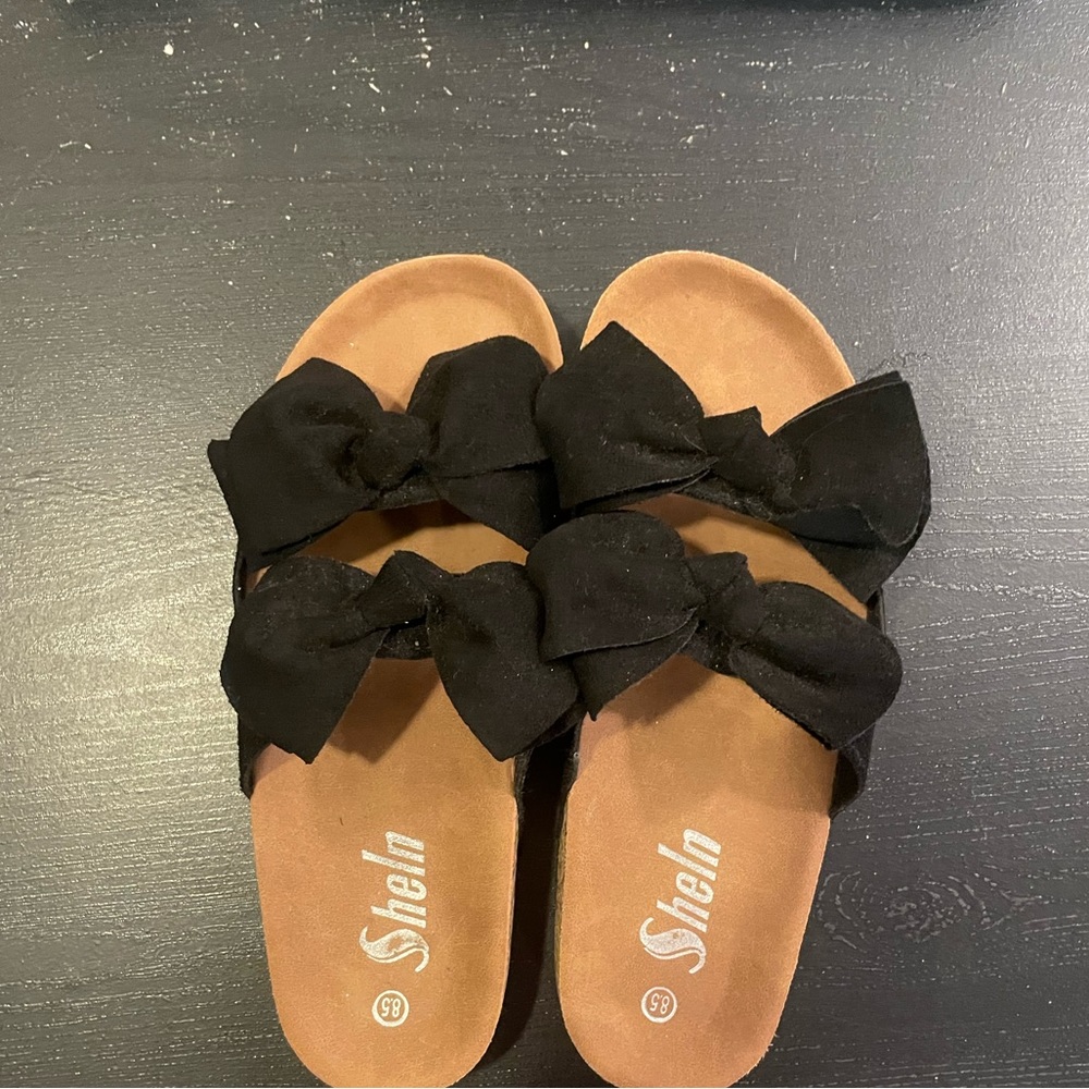 Black bowed sandals